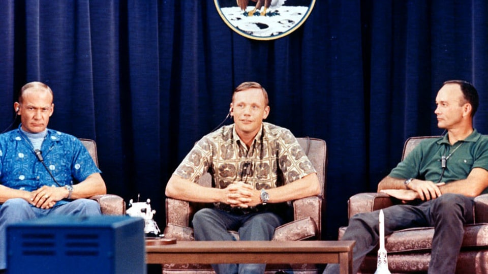 Aldrin, usmívající se Armstrong a Collins na poslední tiskovce před odletem na Měsíc. Vrátili se ale jiní.